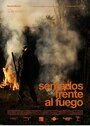 Sentados frente al fuego